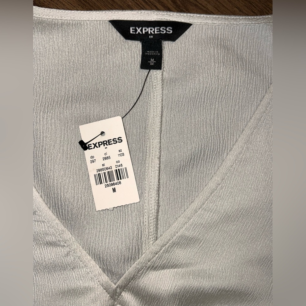 NWT Express Silky Champagne Peplum Top size Medium. - Picture 6 of 9